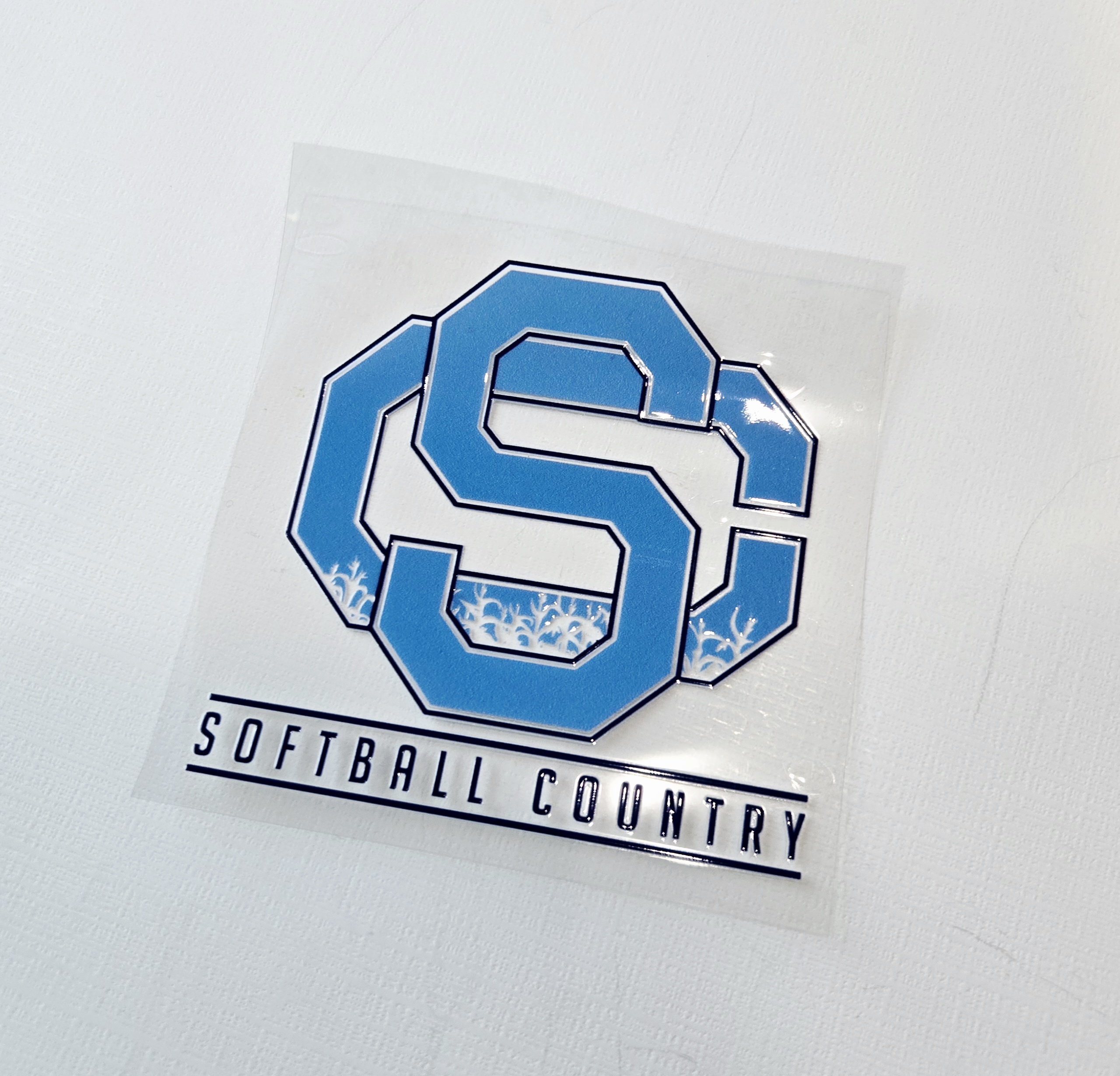 Softball Country UV‑printed window decal for cars, windows, and gear, 4x4 inches